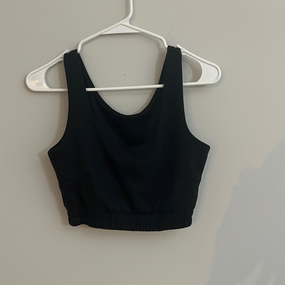 Black sweat material sports bra